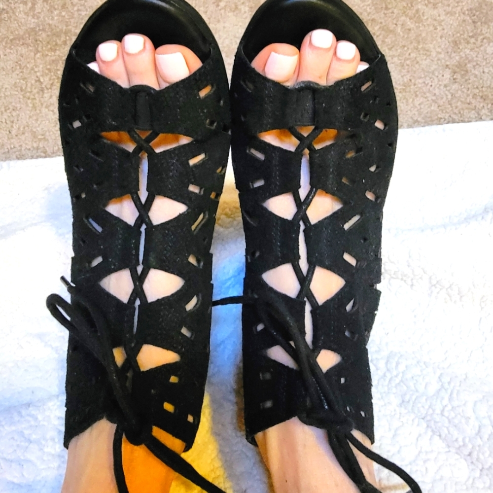 Black lace up cut out caged wedge sandals.  Genuine leather 2 1/2 inch wedge
